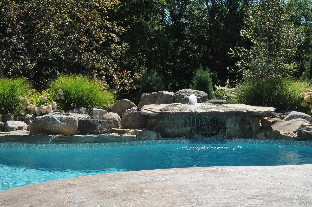 Inground pool with fountains