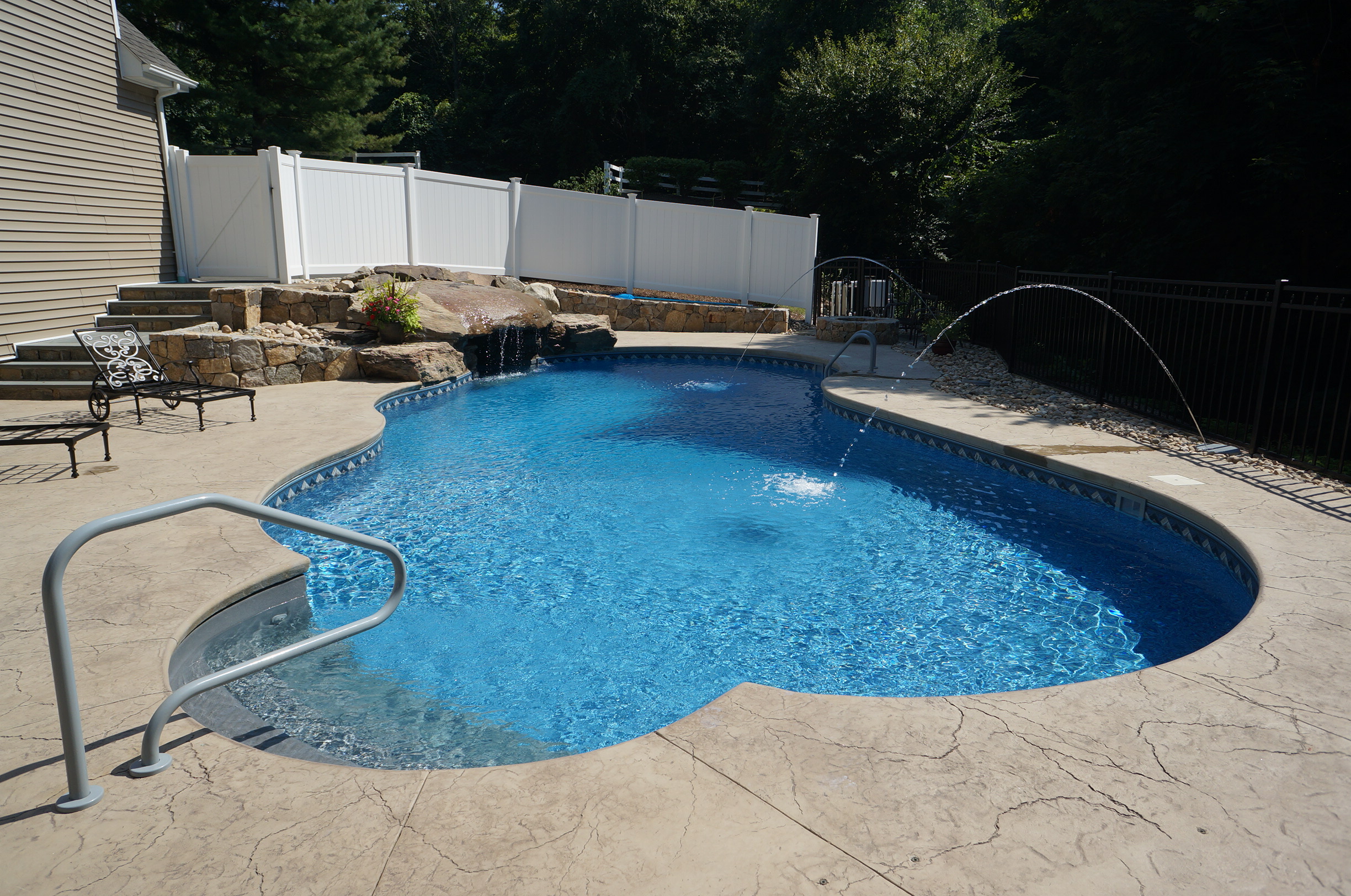 Inground pool with fountains